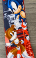 SegaEurope Sonic necktie 5 detail.png